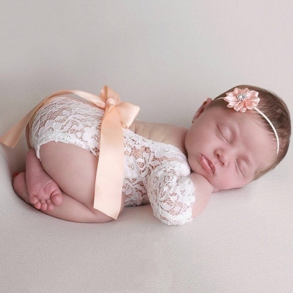Newborn lace outfit with headband. Photo p…